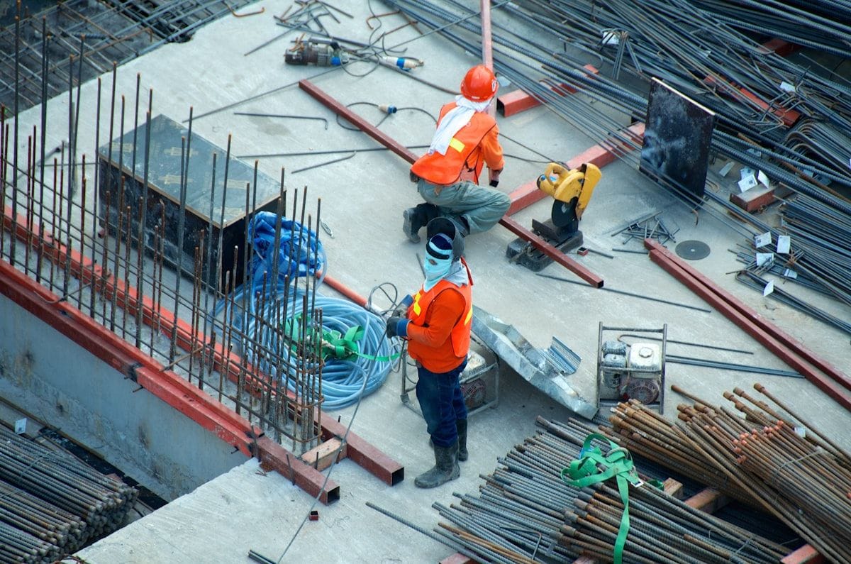Construction workers in PPE on site — health & safety training in practice